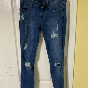 Women's Distressed Blue Jeans